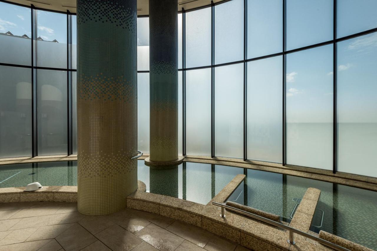 Sheraton Okinawa Sunmarina Resort Онна Экстерьер фото