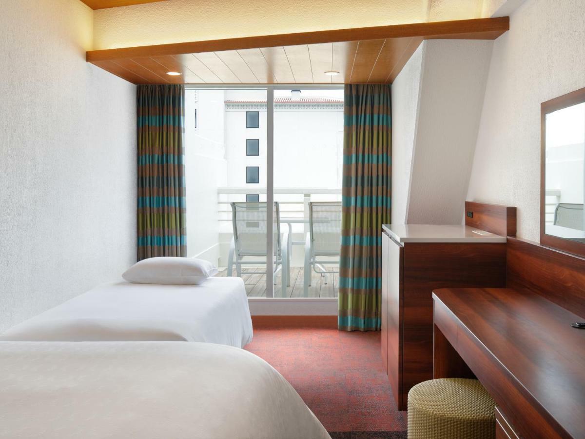 Sheraton Okinawa Sunmarina Resort Онна Экстерьер фото